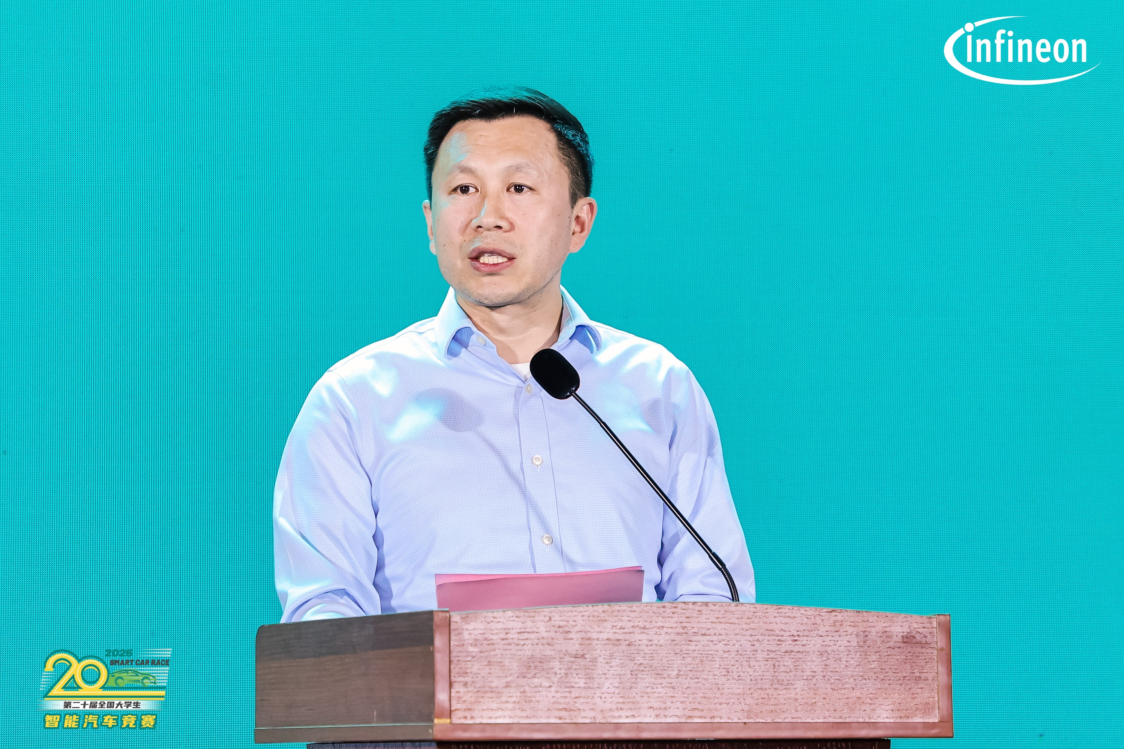 A person standing at a podium with a microphone AI-generated content may be incorrect.